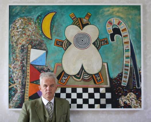 108 Fine Art gallery's Andrew Stewart in front of Alan Davie's Mama Idol, oil on canvas, painted in 1974.