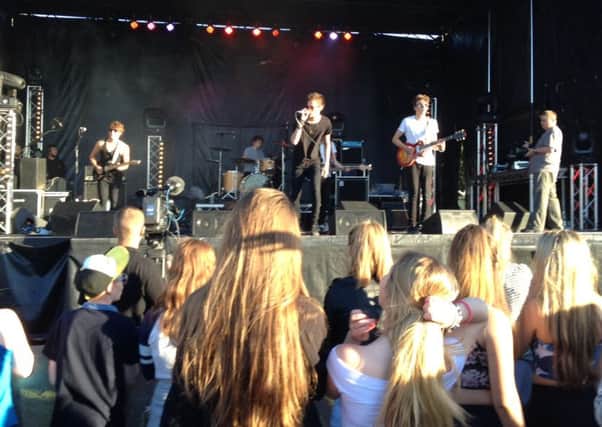 Local indie band Purple Mafia on stage at the Fan Park on The Stray in Harrogate in 2014.