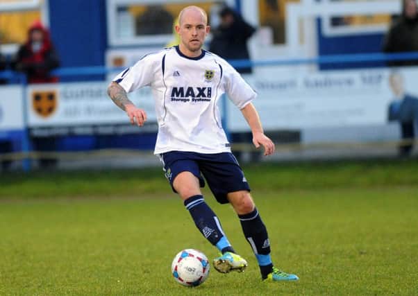 New man: Danny Ellis in action for Guiseley against Harrogate Town last season