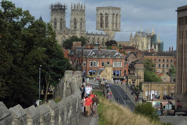 The York city walls, with York Minster as a backdrop.