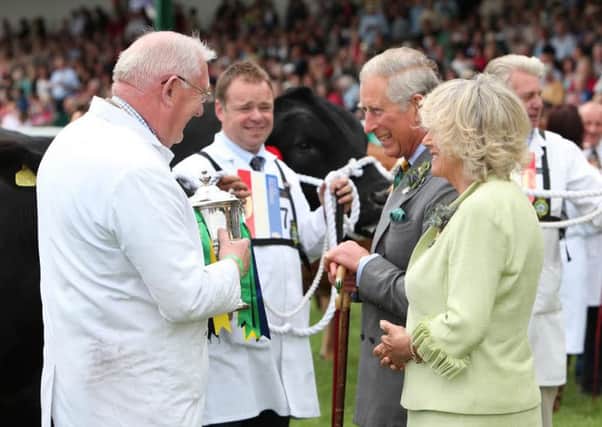Picture shows TRH The Prince of Wales and The Duchess of Cornwall at the 2011 Great Yorkshire Show meeting cattle exhibitors (s).