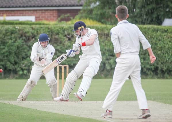 Knaresborough's Eddie Barnes smacks one through the off side (Caught Light Photography)