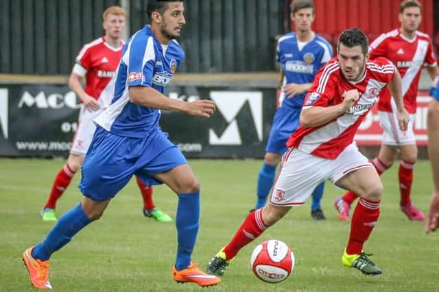 Harrogate Railway's Vincent Dhesi charges forward against Middlesbrough U21s (Photo: Caught Light Photography)