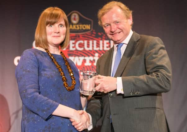 Theakstons Old Peculier Crime Novel of the Year Award winner Sarah Hilary with title sponsor Simon Theakston.