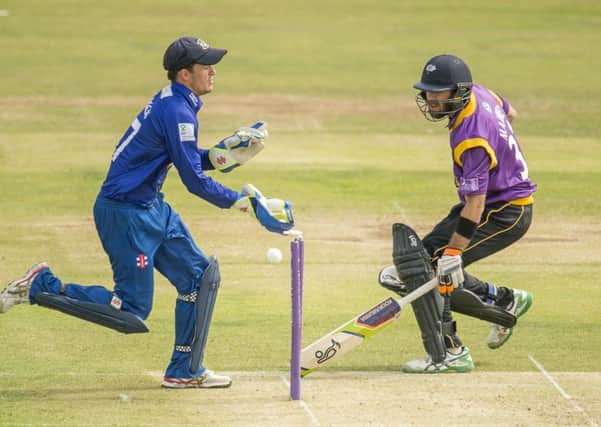Yorkshire's Glenn Maxwell just makes his ground against Gloucestershire wicket-keeper Gareth Roderick. Picture: SWPIX.COM