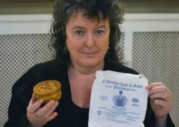 Poet Laureate Carol Ann Duffy with the 'NiddFest' pork pie, courtesy of Weatherhead's.  (Picture by Mike de Horsey)