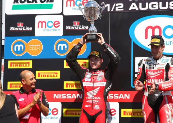 Dan Linfoot collects second prize on the podium