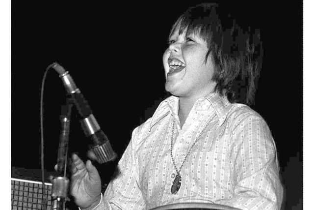 "Little" Jimmy Osmond performing in his early 1970s heyday.
