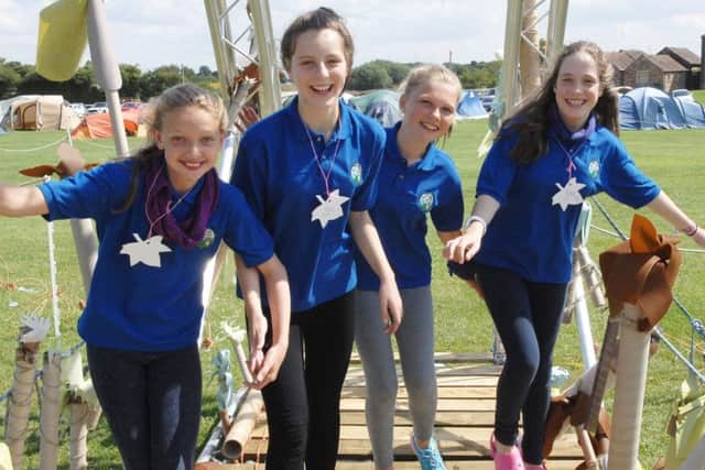 NARG 1508082AM7 Guides at Ripon Racecourse. Guides Kate, Katie, Emily and Megan. make it across a bridge in one of the competitons.  (1508082AM7)