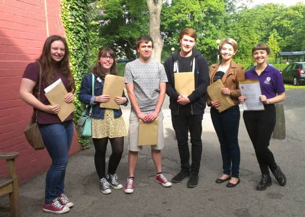 Form left to right: King James's School students Alex Gray, Molly McGrath, James Hare, Luke Gray, Stephanie Newell and Caitlin Mawhinney stand with their results after a successful day