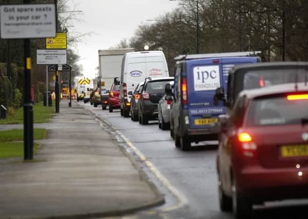 tis  Traffic into Harrogate on Leeds Road.  (140205M4c)