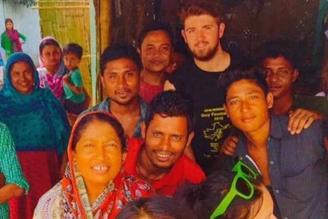 Harrogate charity adventurer Cory McLeod with villagers in India.