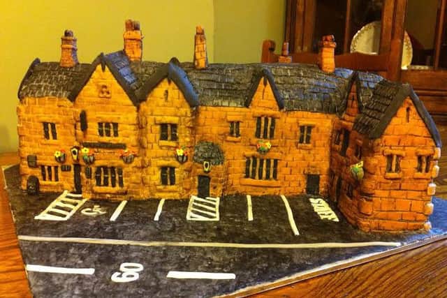 Julie Taylor's cake version of The Station, Birstwith, which has never been cut into