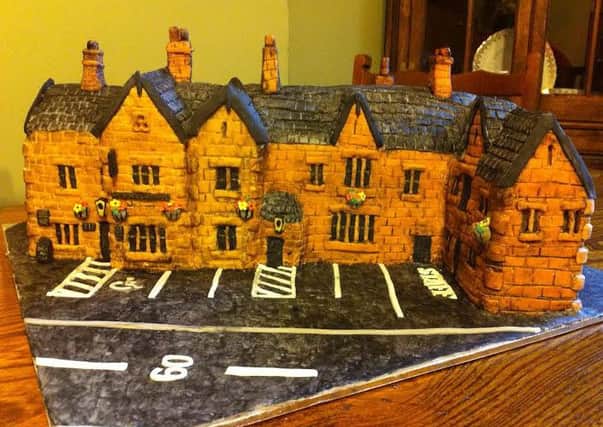 Julie Taylor's cake version of The Station, Birstwith, which has never been cut into