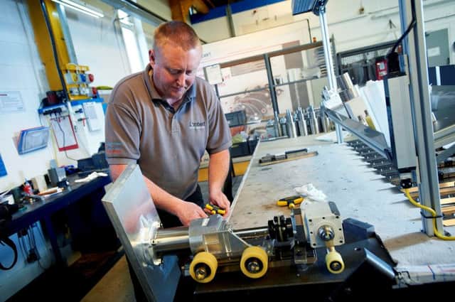 Employee Christian Richmond at work at Lambert's manufacturing base in Tadcaster. (S)