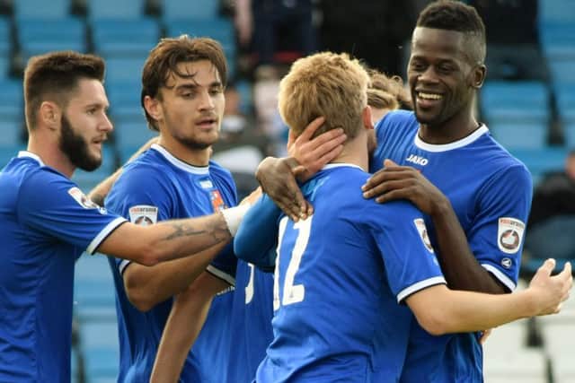 Town players celebrate Jordan Thewlis' goal
