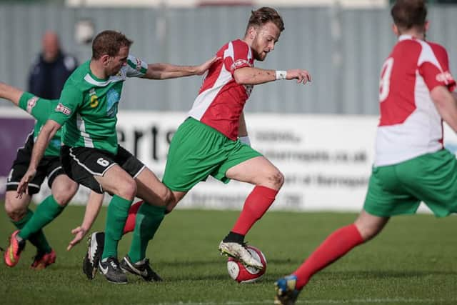 Railway's Fatlum Ibrahimi surging forward against Brighouse Town (Photo: Caught Light Photography)