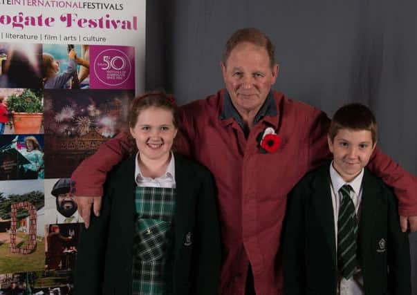 Harrogate History Festival - Brackenfield School pupils, Abby Johnston-Jones, 10, and Rory Johnston-Jones with famous author Michael Morpurgo. (Picture by Charlotte Graham)