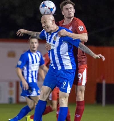 Lee Hughes in action for Worcester City
