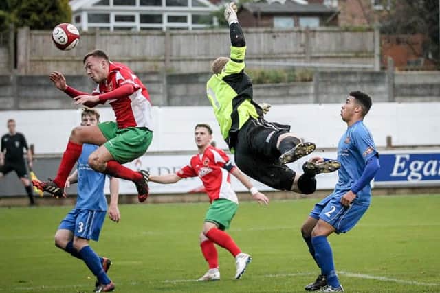 Jack Stockdill narrowly misses a header in front of goal against Clitheroe (Photo: Caught Light Photography)