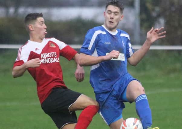 Knaresborough Town's George Eustance challanges for the ball. PIC: Craig Dinsdale.