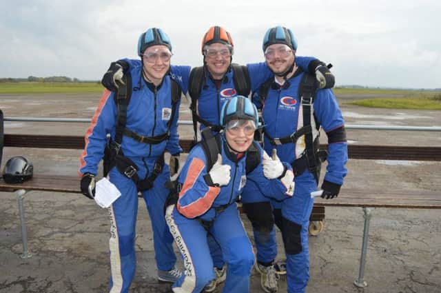 Four employees at EnviroVent helped the company reach its fundraising target by completing a skydive: (l to ) Sam Mallows, Larry Soper, Matthew Insley and (front) Jane McLean.