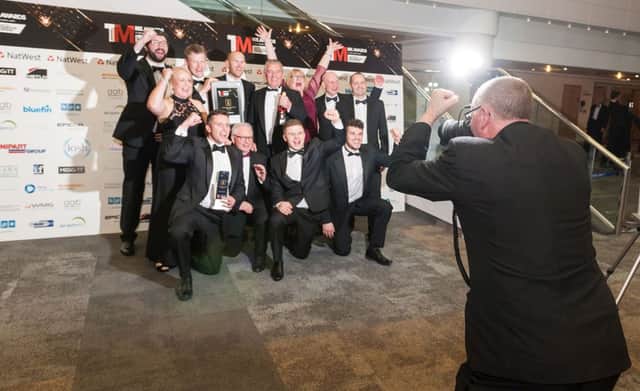 The team from Tadcaster engineering firm Lambert picks up the Manufacturer of the Year title at the TMMX Awards 2015 hosted by the Institution of Mechanical Engineers and The Manufacturer magazine. (S)