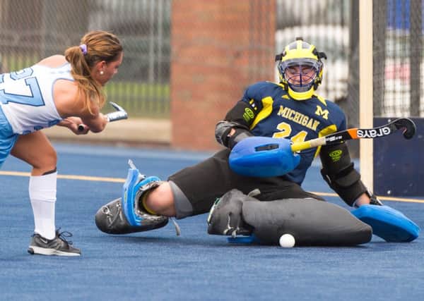 Sam Swenson in goal for the University of Michigan