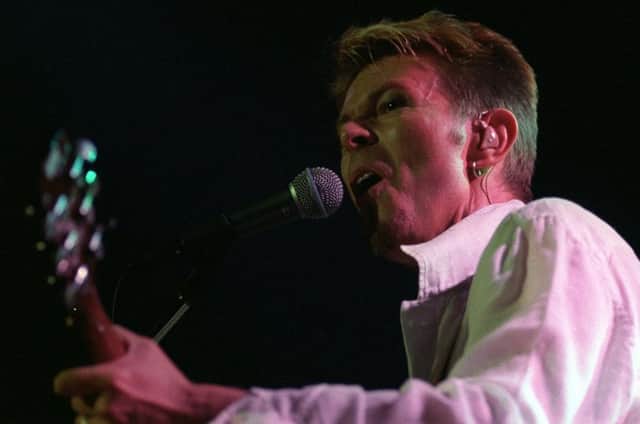 David Bowie on stage at the Town and Country Club in Leeds in 1997.