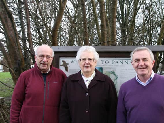 Pannal Village Society stalwarts celebrate their success in the battle for a Pannal Parish Council. From left, former chairman Peter Stretton, Dorothy Little, secretary, and Howard West.
