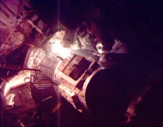 Tim Peake undertakes a spacewalk to help repair a broken power unit of the International Space Station