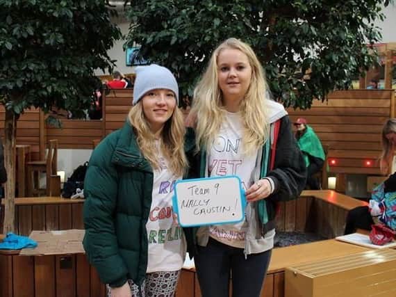 Millie Carrington (left) and her friend from Uni, Maddy Austin just before they set-off hitch-hiking to Paris