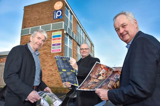 Colin Wilding (left), managing director of Harrogate Printing, and David Wyvill, CEO of Platinum Print, celebrate the merger with Giles Clegg, of Lupton Fawcett Denison Till, who advised Platinum Print. (S)
