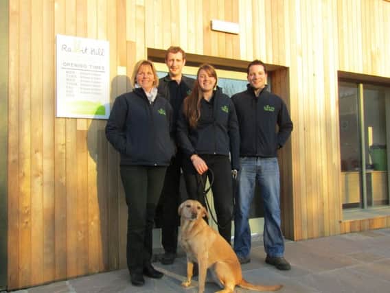 Rabbit Hill Country Store owners Glenn Brown and Katy Bielby (centre) with Angie Johnson (left), Gordon Jackson (right) and dog Isla. (S)