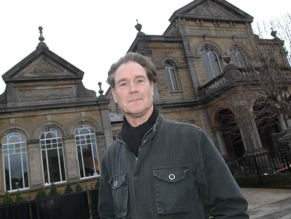Mark Hinchliffe outside the Sunday school and chapel on Grove Road