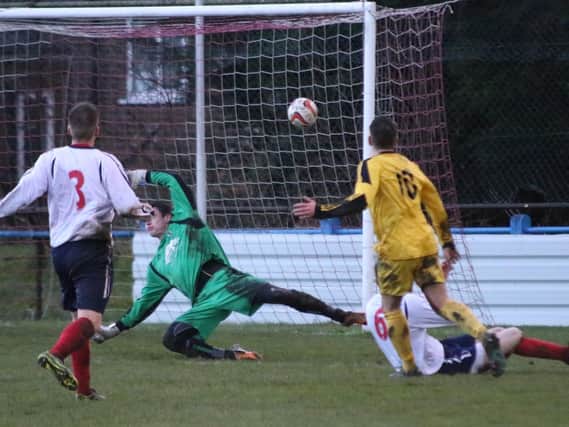 Brad Walker watches as his effort hits the back of the net (Photo: Craig Dinsdale)