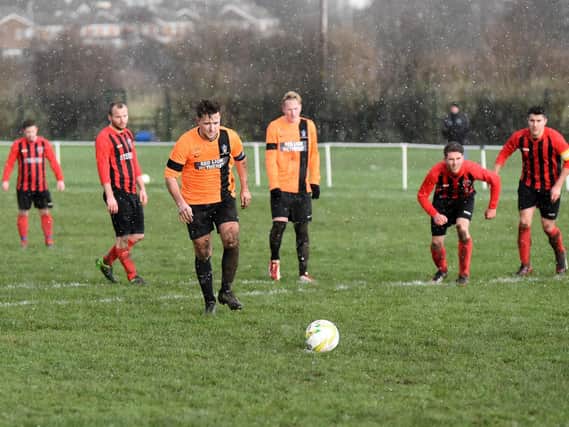 Tom Hesketh scored a penalty for Wetherby Athletic at Horbury Town (Photo: Visualised Photography)