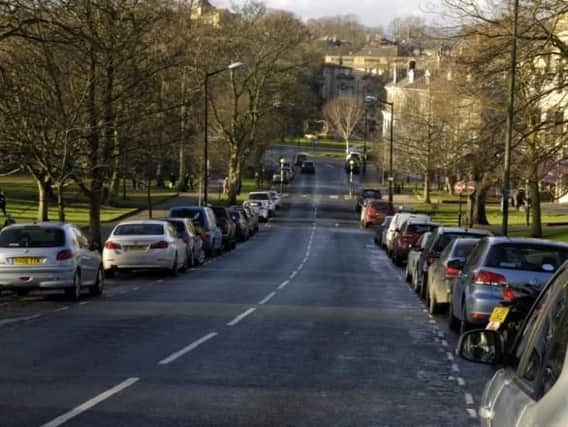North Yorkshire County Council is postponing a decision on the introduction of on-street parking charges on Sundays and evenings in Harrogate town centre.