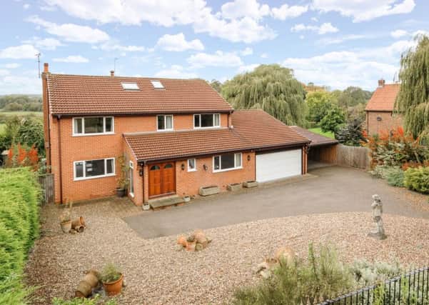 Riversmead, Ouston Lane, Tadcaster - Â£550,000 with Hunters, 01937 588228.