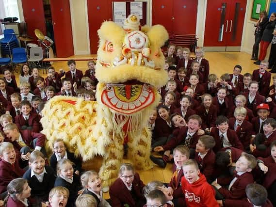 Pupils at Ashville College took part in a workshop with Six Harmonies Lion Dance Crew to mark Chinese New Year 2016 (s).