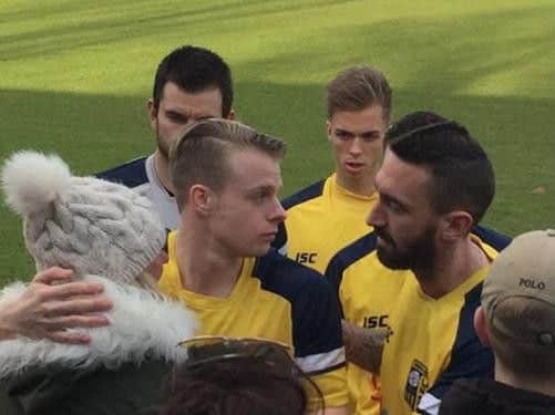 Tadcaster Albion players comfort Sonny's mother Anna Marie Clark (s)