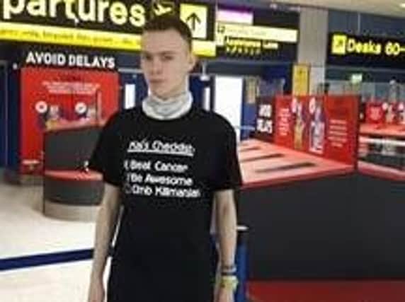 Kai Sunley at the airport about to set off for Africa.