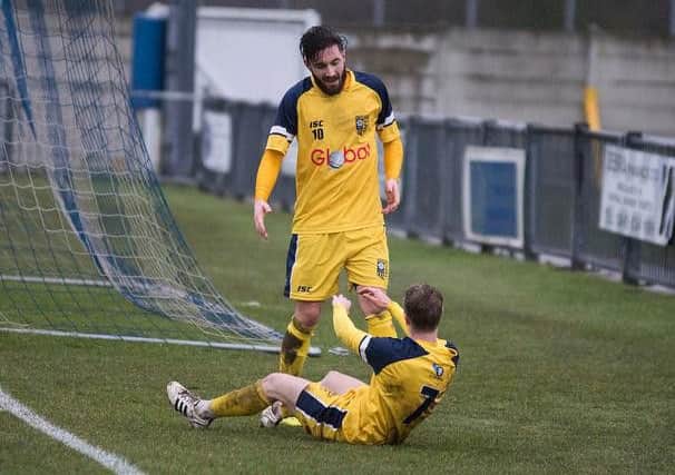 Josh Greening celebrates with Adam Baker, who scored Tad's second of the afternoon (Photo: Ian Parker)