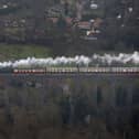 An aerial view of the Flying Scotsman going over the Digswell Viaduct near Welwyn Garden City on its inaugural run from London to York after a decade long, Â£4.2 million refit. (Picture: Steve Parsons/PA Wire)