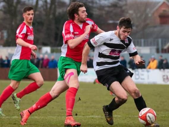 Rob Youhill in action for Harrogate Railway last season against the team he later joined, Darlington 1883 (Photo: Caught Light Photography)