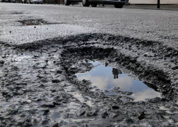 Reader David Etchells is calling on the council to fix potholes