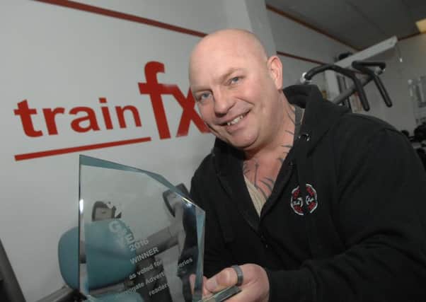 Owner of Train FX Health Studio Danny Dickson with The Harrogate Advertiser Series Gym of the Year Award  for 2016. (1603152AM1)