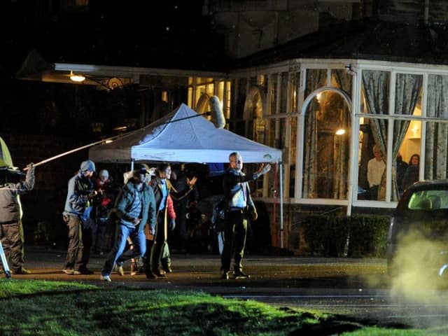 Stephen Tompkinson, as Detective Chief Inspector Alan Banks, and  Andrea Lowe, as DS Annie Cabbot during filming at the Cairn Hotel in Harrogate.