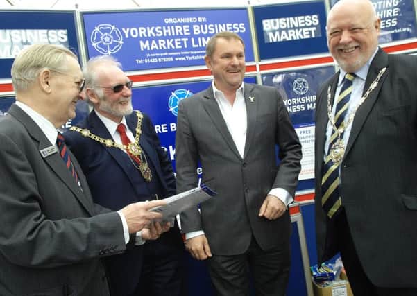 Sir Gary Verity shares a joke with the organiser of the Yorkshire Business Market Brian Dunsby, The Mayor of Harrogate Coun. Nigel Simms and The President of Harrogate Chamber of Trade and Commerce Mick Shaw. (1604182AM4)