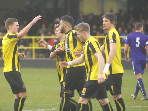 Harrogate Town players celebrate one of Brendon Daniels' goal against Corby Town on Saturday